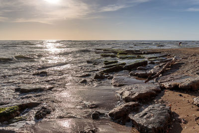 Scenic view of sea against sky during sunset