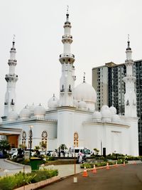 Low angle view of mosque against sky