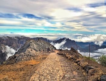 Scenic view of rocky mountains against sky