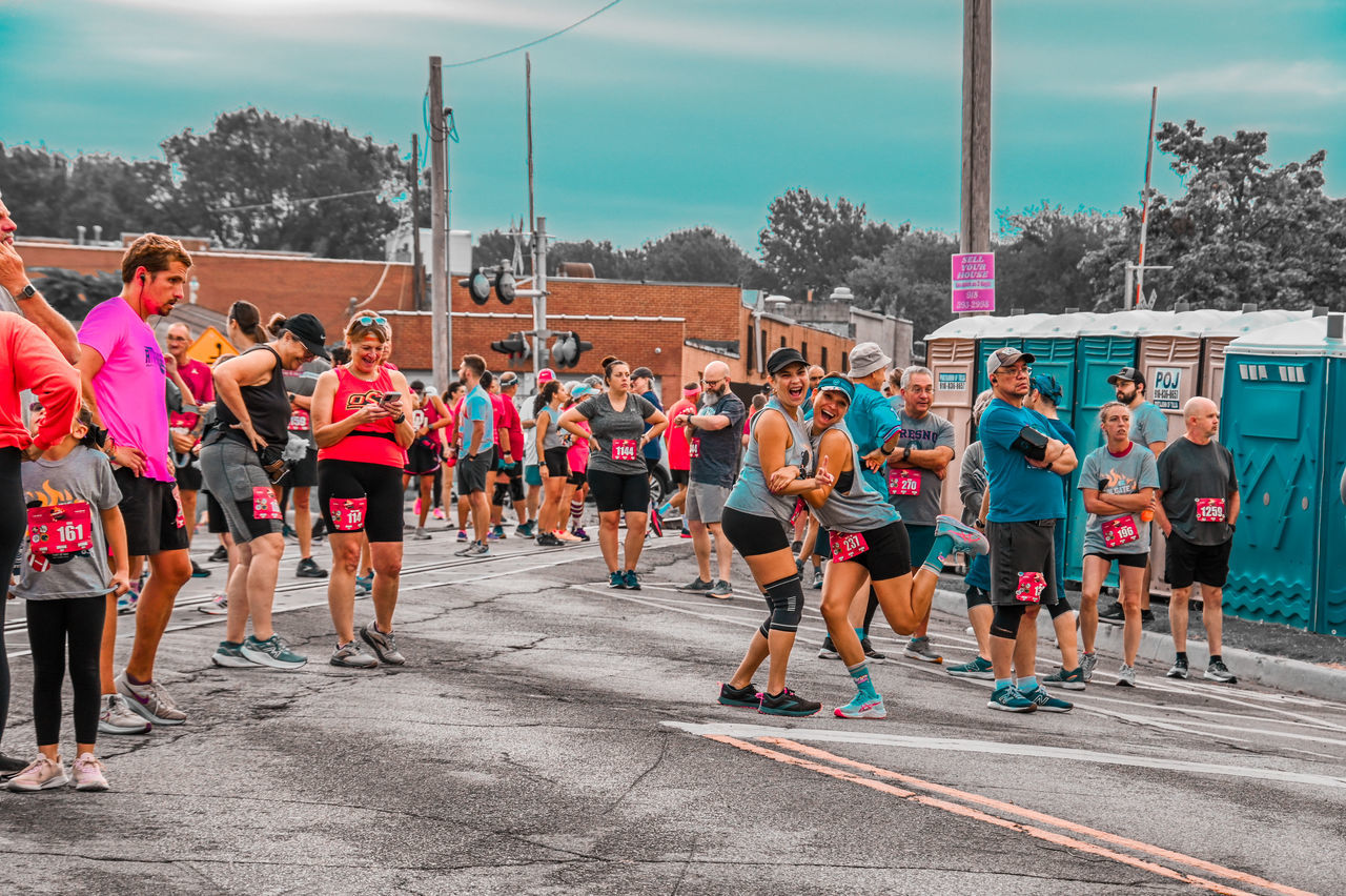 group of people, sports, crowd, person, track and field event, large group of people, adult, sky, lifestyles, running, city, architecture, race, men, women, exercising, long distance running, nature, street, clothing, athlete, day, recreation, sports clothing