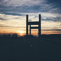 Silhouette of road at sunset