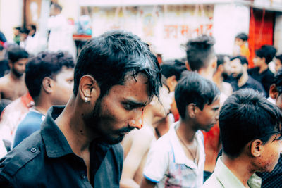 Group of people looking at market