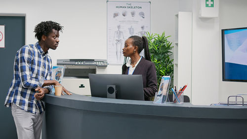 Business colleagues working in office