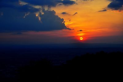 Scenic view of sea against romantic sky at sunset