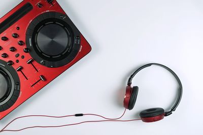 High angle view of musical equipment over white background