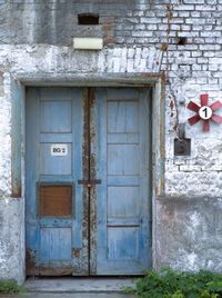 Closed door of abandoned house