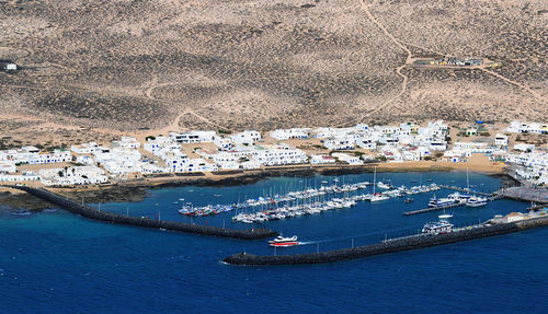 High angle view of sailboat sailing on sea