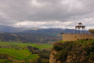 View of landscape against cloudy sky