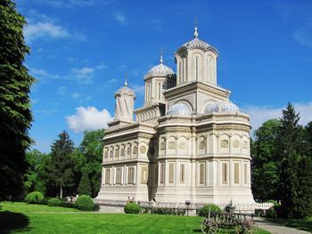 Low angle view of churh against blue sky