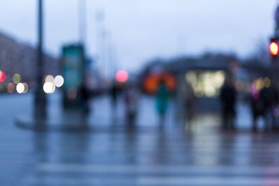 Defocused image of illuminated city street
