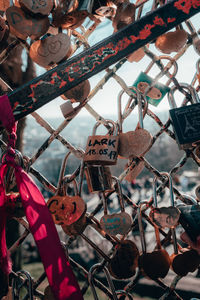 Close-up of padlocks on railing