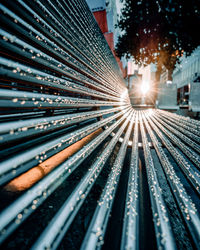 Railroad tracks in city at night