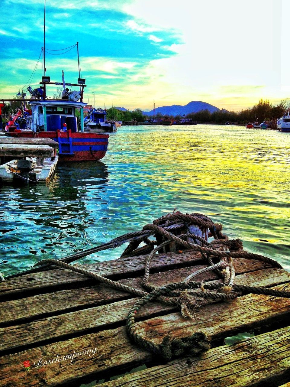 water, transportation, nautical vessel, mode of transport, moored, sky, boat, sea, cloud - sky, cloud, harbor, lake, nature, river, outdoors, day, rippled, tranquility, travel, tranquil scene