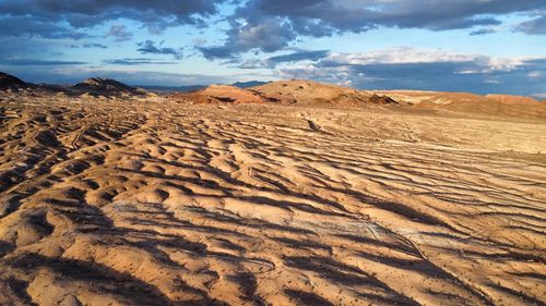 Scenic view of desert against sky