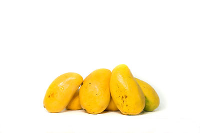 Close-up of fruits against white background