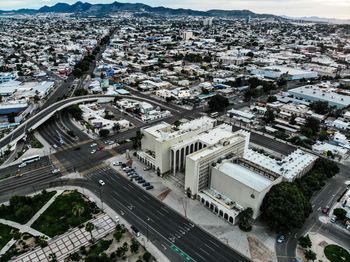 High angle view of street amidst buildings in city