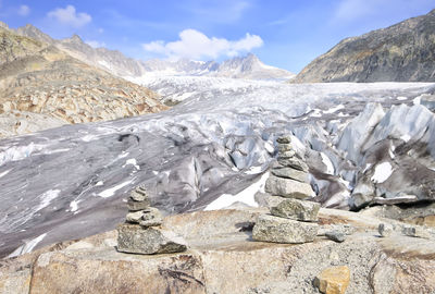 Scenic view of landscape with mountain range in the background