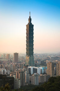 Modern buildings in city against sky