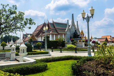 View of temple against buildings