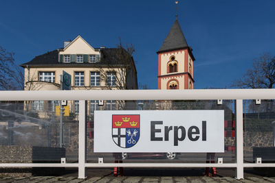 Text on building against sky