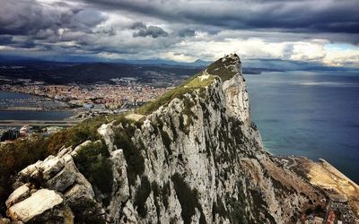 Rock of gibraltar against cloudy storm sky