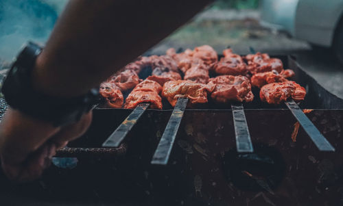 Close-up of meat on barbecue grill