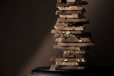 Close-up of coins against black background