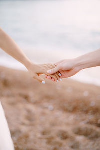 Close-up of woman hand on finger