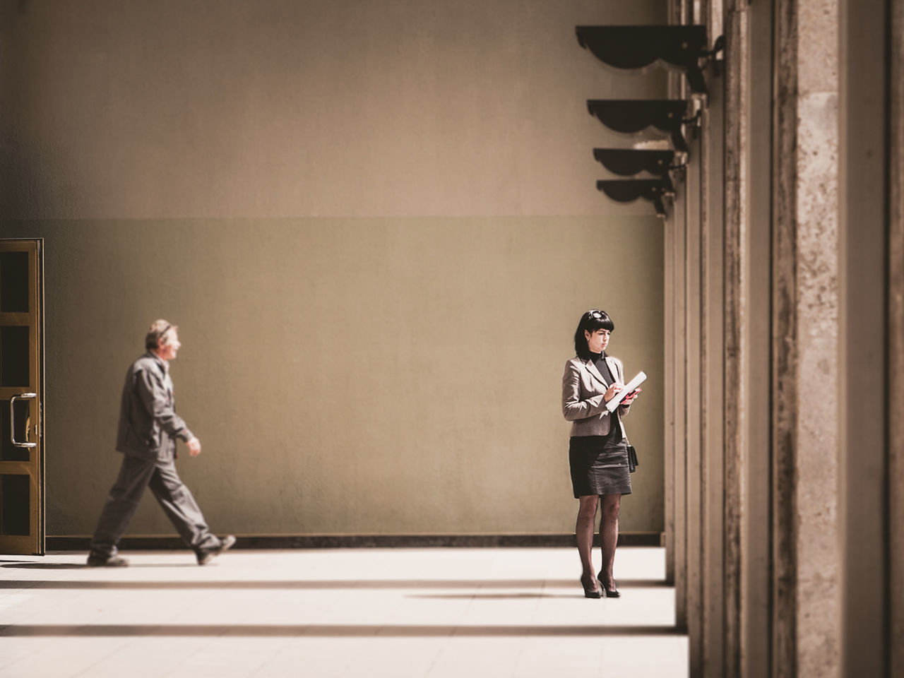 WOMAN STANDING IN A CITY