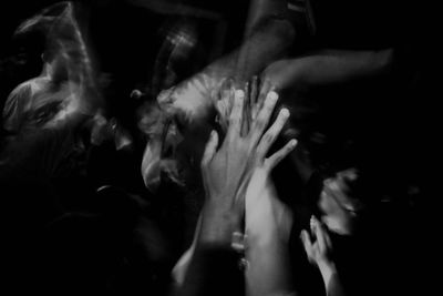 Group of people enjoying at music concert