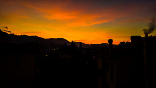 Scenic view of dramatic sky during sunset