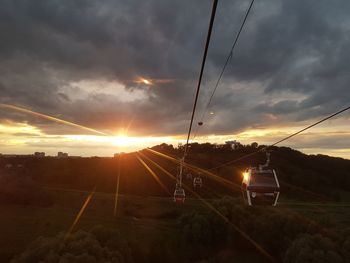 View of overhead cable car at sunset