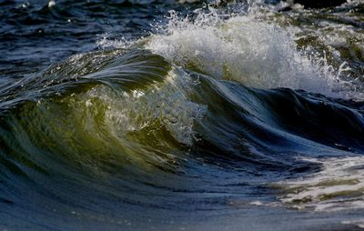 Close-up of water splashing in sea