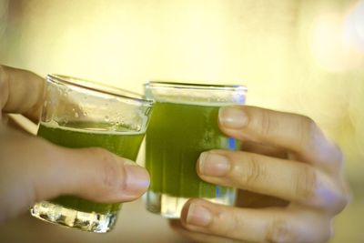 Close-up of hand holding wine glass