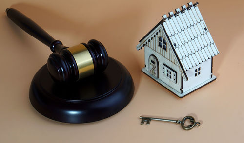 High angle view of clock on table