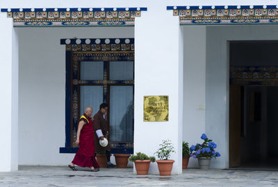 People at entrance of building