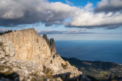 High rocks ai-petri of crimean mountains. black sea coast and blue sky with clouds. ukraine