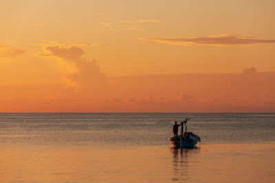 View of small fisherman boat in shallow waters of indian ocean, maldives 