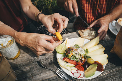 High angle view of man preparing food
