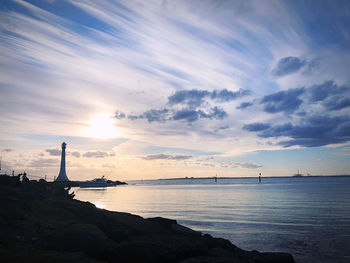 Scenic view of sea against sky during sunset