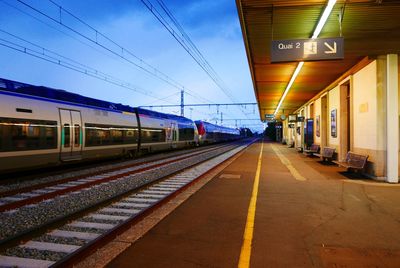 Railroad station platform against sky