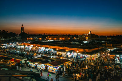 High angle view of illuminated city at night