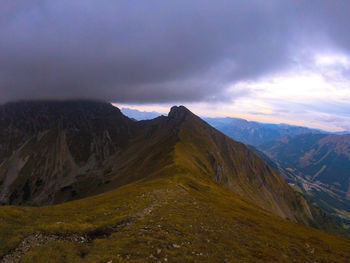 Scenic view of mountains against sky during sunset