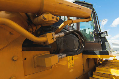 Close-up of yellow machine