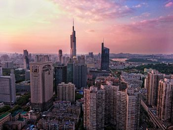 View of cityscape against sky during sunset