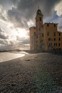 View of beach against sky during sunset