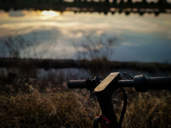 Close-up of bicycle on field