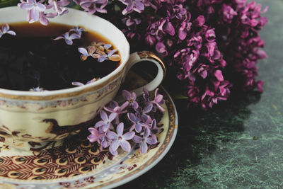 Close-up of purple flowers in pot on table