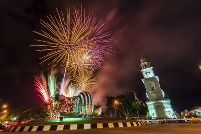 Firework display at night