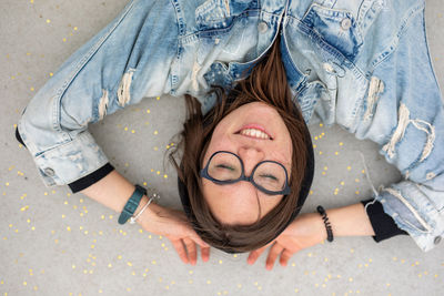 High angle portrait of woman lying down